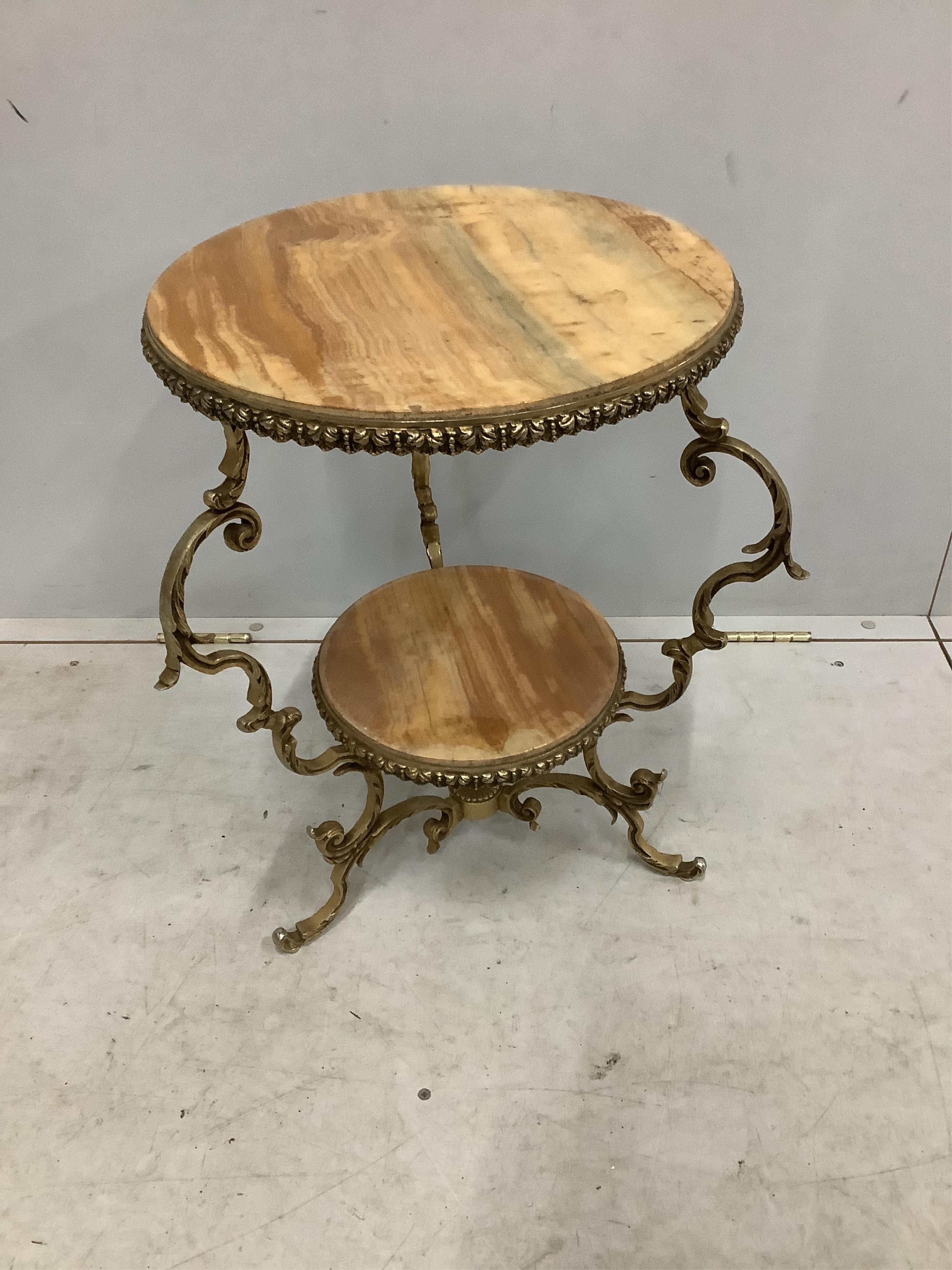 A gilt metal and onyx two tier occasional table, diameter 48cm, height 55cm. Condition - fair